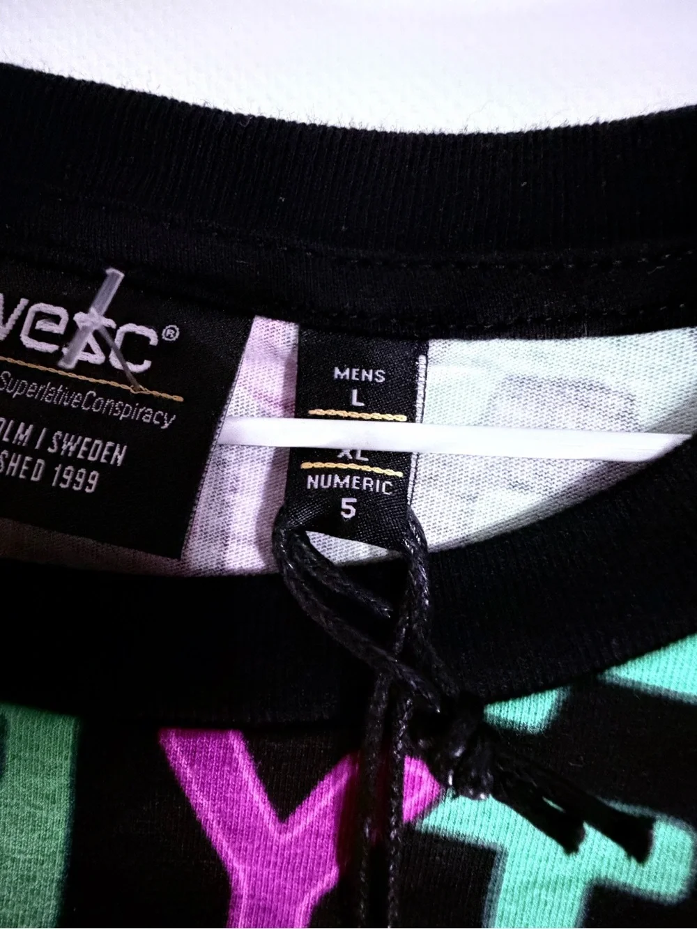 Wesc Black Tee with Purple & Green All-Over Text Print